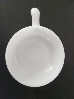 Glasbake white milk glass soup bowl with a single handle.